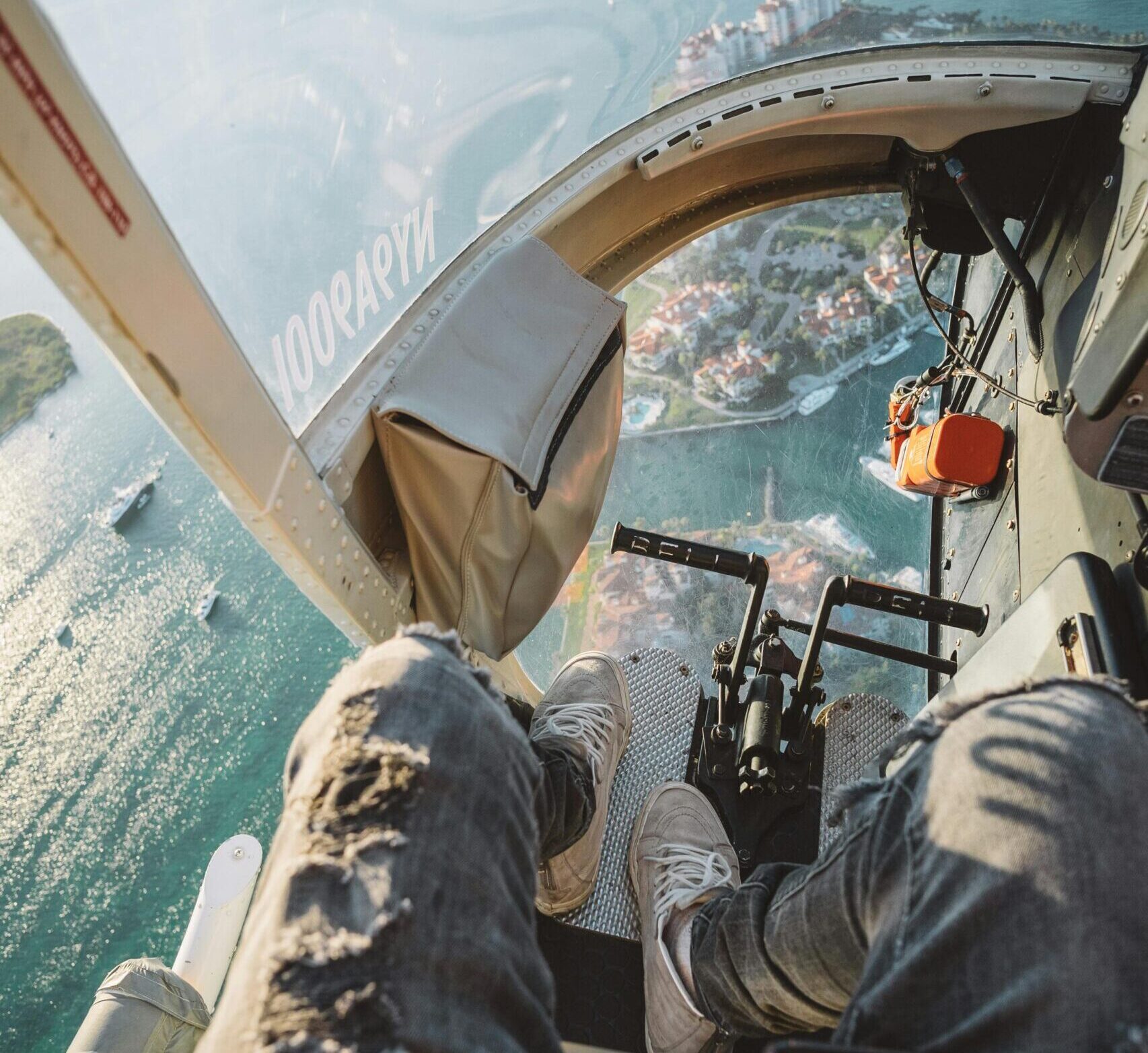 Experience the thrill of a helicopter flight with stunning aerial views of Miami's skyline and ocean.